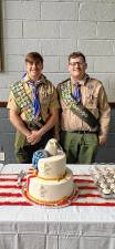 ES1 Ryan Tartarilla, left, and Edward Satkowski are honored for becoming Eagle Scouts. (Photos provided)