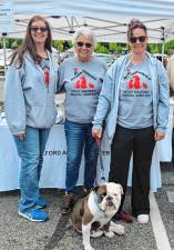 West Milford Animal Shelter Society volunteers, from left, Robyn Walsh, Cookie Iacovino and Andrea DeSalva with Lily at a recent event hosted by ShopRite. (Photo provided)