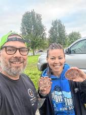 Christopher Sobel and Renee Allegra ran the 101-mile ultramarathon together in May.