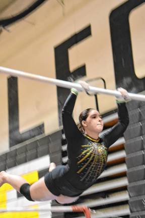 GY2 Senior captain Stephanie McManus on the uneven parallel bars.