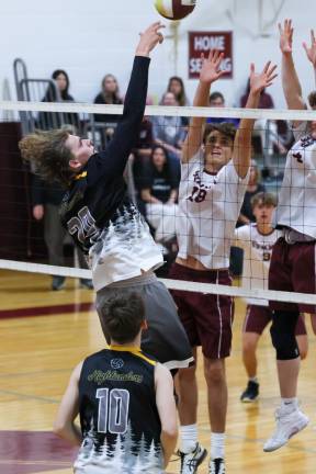 Andre Christ gets a shot over Summit’s front row.