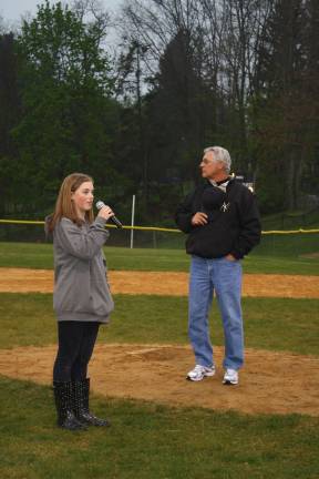 Macopin Middle School student Brooke Reilly sang the National Anthem at the Little League opening night.