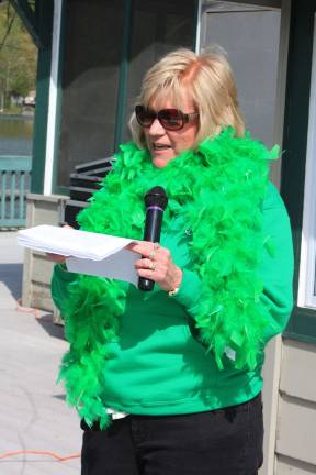 Photos by Ginny Raue Patti Kane, who lost her husband Danny to lymphoma, addresses the crowd of &quot;Irish Whisper Walk for Hope&quot; walkers who came out to raise funds for the Lymphoma Research Foundation.