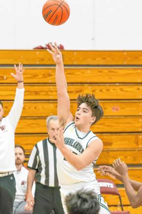 Tyler Liguori puts up a short jumper for the Highlanders during third-quarter action at Wayne Hills.