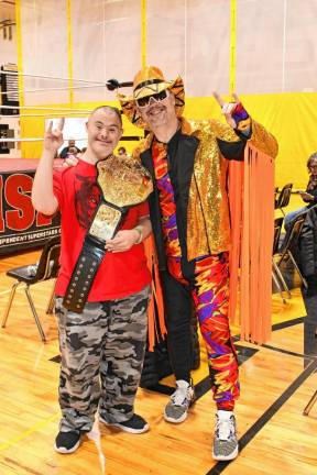 TW2 James Hackett of Ringwood poses with wrestler Jason Maass at the Thanksgiving Thunder wrestling fundraiser Saturday, Nov. 23 at West Milford High School. (Photos by Maria Kovic)