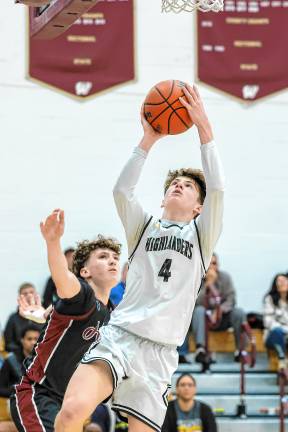 Cole Stillman of West Milford goes up for two points in the fourth quarter against Wayne Hills.