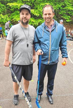 Joe Romano, left, ran the street hockey program in May. With him is Dan Kochakji, the township’s recreation director.
