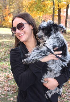 Nothing makes you feel better than hugging a dog. Brianna Zasa and Axle prove the point.