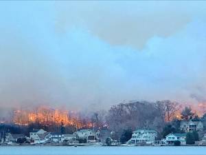 WMF1 Flames are visible on the east shore of Greenwood Lake about 5 p.m. Sunday, Nov. 10. (Photo by Denise von Wilke)