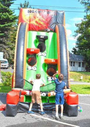 Boys try their hand at the Hoop Zone, a new addition this year.