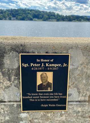 This memorial plaque is on the Jefferson Avenue bridge in Pompton Lakes, where Peter Kamper Jr. was a police sergeant. He died in a motorcycle accident in 2017.