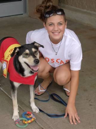 Marissa Ciancitto volunteering with One Step Closer Animal Rescue (OSCAR).
