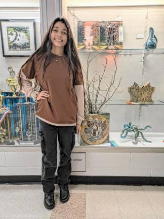 Wallkill Valley Regional High School student Suelin Wong with her artwork ‘Self Embracement’ that won Best in Show in the 15th annual Wallkill Invitational Art Show. (Photo provided)