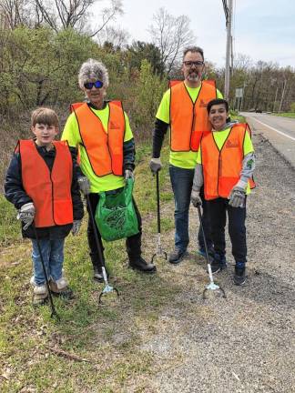 From left are Joseph Bosland, 12; Bob Manning; Daniel Cibenko; and Jayden Cibenko, 11. (Photo by Kathy Shwiff)