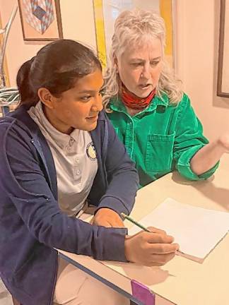 Jean Kelly, right, teaches student Raegan Kopko, 14, at her fne arts studio in West Milford. (Photo provided)