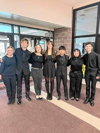 Playing in the North Jersey Area Wind Ensemble, from left, are Anna Koenemund, Colin Quirk, Sarah Humble, Shayla McPhee, Prince Johnson Limos, Nikole Garcia and Jake Janis.