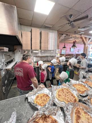 PZ1 Members of the Apshawa Cub Scout Pack 139 recently spent the afternoon at DeMarco’s Pizzeria &amp; Restaurant in Hewitt learning the art of pizza making. (Photo provided)