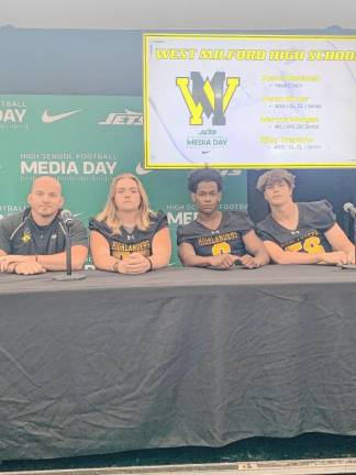 West Milford head football coach Steve Maslanek, left, with players Riley Treptow, Marcus Morgan and Owen Ginder on Aug. 6 at the High School Football Media Day at MetLife Stadium. (Photo by Bryan Fumagalli)