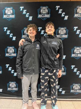 PC3 Senior swim team captains Tyler Roer, left, and Michael DeMarco celebrate their victory in the 2025 Passaic County meet.