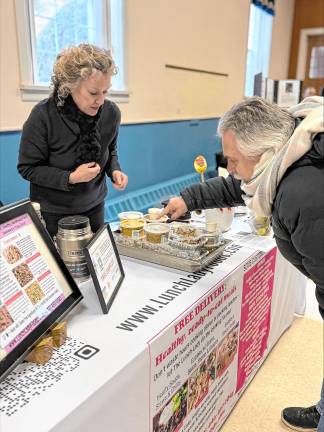 Eugene Voll of West Milford checks out what’s on the menu at the Lunch Lady’s table.