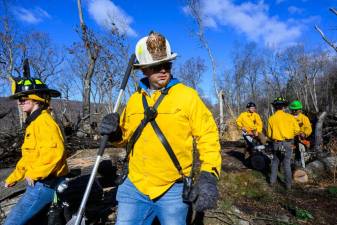 Firefighters help contain the Jennings Creek Fire on Nov. 12.