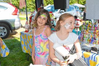 <b>Emma Vilardo and Carly Deo, both of Stanhope, show off their face tattoos at the Stanhope Fall Festival on Saturday, Oct. 5. (Photos by Maria Kovic)</b>