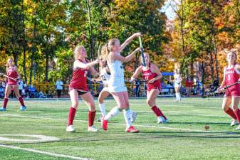 Brodie Loveland of West Milford reaches up to knock down a pass made late in the fourth quarter of the Passaic County Tournament final Saturday, Oct. 24 at Passaic Tech. Pompton Lakes won, 2-1, taking the title for the third year in a row. (Photos by Glenn Clark)