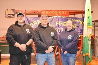 From left, Chief Keith Weber, current president and former chief Mike Spoelstra, and Lt. Kathryn ‘Kat’ Weber of the Greenwood Forest Fire Company #3, which is 100 years old. (Photo by Rich Adamonis)