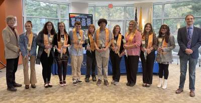 Sussex County Community College Phi Theta Kappa inductees gather in the Performing Arts Center after the ceremony. (Photo provided)