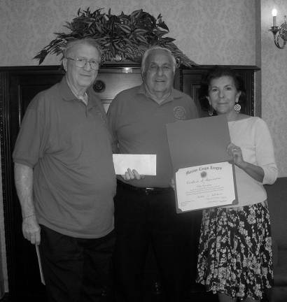 Michele Bucci, right, outreach director for Chelsea Senior Living, is seen here with Marin Corp LEague Slattery Division representatives Jim Heien and Dave Katz.