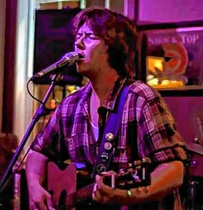 Kaelan Delaney plays a solo acoustic set Saturday night at the Grasshopper Irish Pub in Newfoundland. (Photo courtesy of Kaelan Delaney)