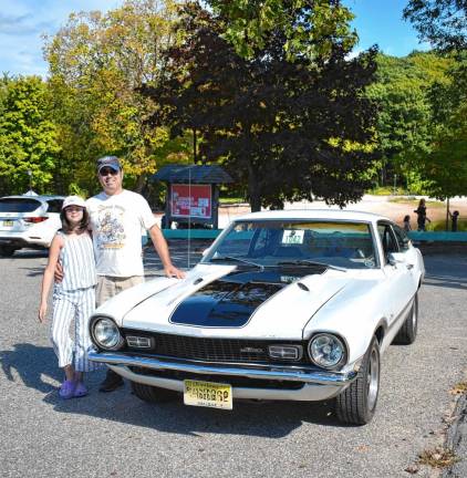 CC6 Sean Clarke and his daughter Cathryn pose by their 1972 Ford Maverick Grabber.