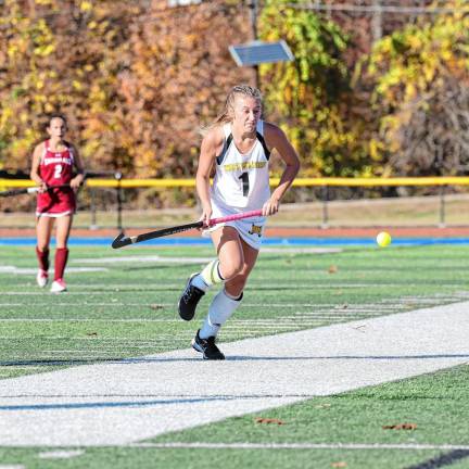 West Milford’s Vivian Sirnik chases the ball along the sideline.