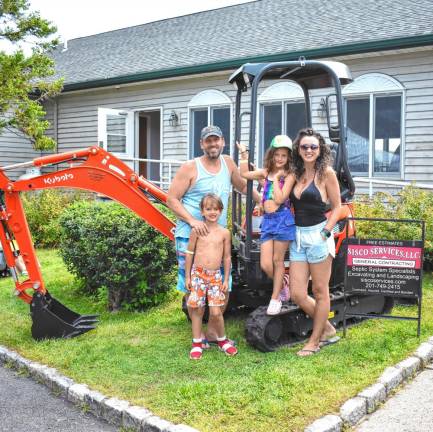 The Sisco family was a sponsor of the event. From left are DJ, Harper, Turner and Marta Sisco-Izak.