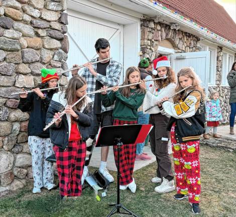 The West Milford High School Band’s woodwind ensemble entertains. From left are Lauren Jakobezuk, Kayla Woolf, Evan Riley, Charlee Battle, Donna Stinziano and Skylar Dempsey.