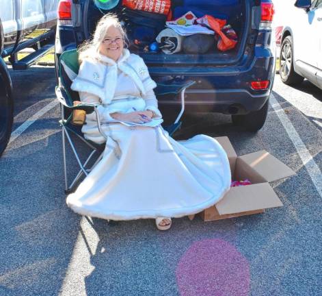 Donna Hess, a teacher at Lakeland Regional High School, is dressed as a snow queen.