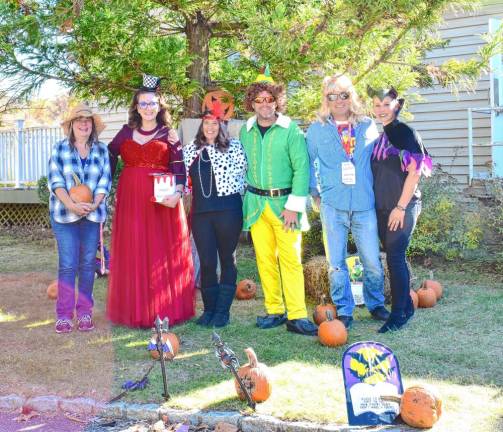 The volunteers who organized the Trunk or Treat, from left, are Linda Tonnessen, Barbara Magzy, Danielle and Doug Grayson, and Anthony and Melissa Giannantonio.