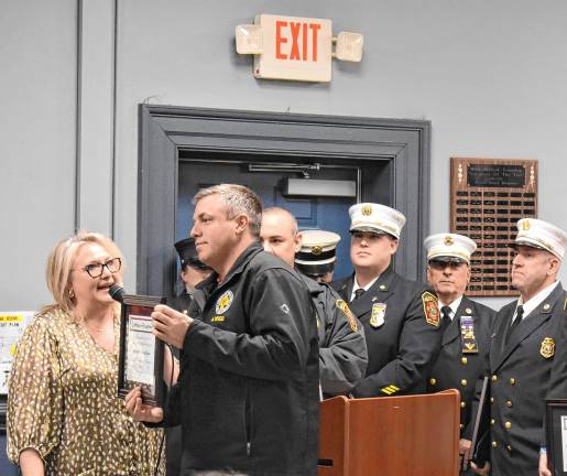 Officials honor firefighters