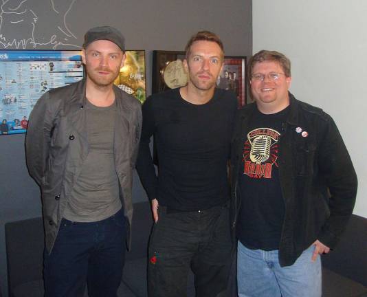 Rob Quicke, right, is seen here with Chris Martin, center, and Jonny Buckland, left, of Coldplay. Martin will be launching the second annual College Radio Day with a message of support.