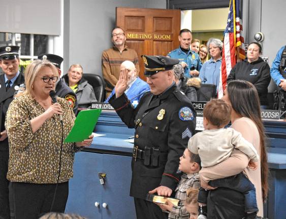 Thomas Connors is sworn in as a police sergeant Feb. 12.