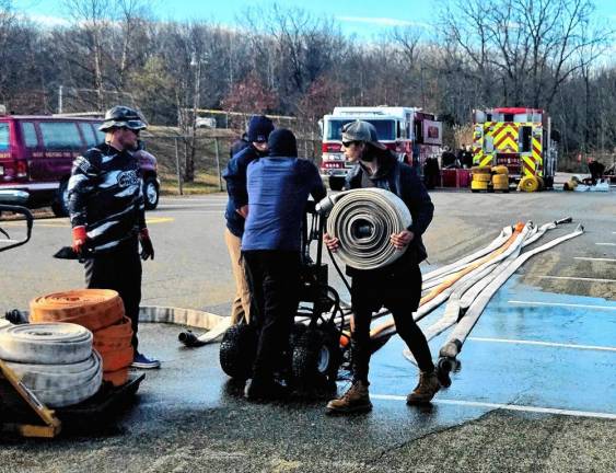 Members of Greenwood Forest Fire Company #3 do a mandatory annual equipment evaluation and inspiration Nov. 19. (Photo by Rich Adamonis)