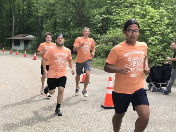 SF1 Participants in Scott’s Fun Run follow the course set up at the West Milford Recreation Center on Saturday, May 13. (Photos by Kathy Shwiff)