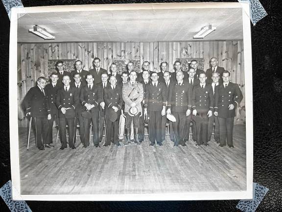 FC1 Community Fire Company of Newfoundland and Oak Ridge members are shown in a 1959 photo celebrating the 125th anniversary of the birth of West Milford Township. New Jersey State Trooper Edward Valeich, center of the front row, and his wife, Marie, served in the fire company and woman’s auxiliary. (File photo by Ann Genader)