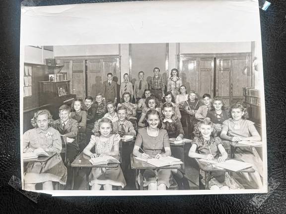 Newfoundland school upper-grade students in the mid-1940s or early 1950s. In front row, from left, are Carl Cahill, LeRoy Tice, Mildred Hannah and Margery Sisco. Second row, from left, Nancy Doland, Wayne Post, Walter Crane and Marilyn Post, Third row, from left, Ida VanderStad, Jean Richards, Margaret Norman, Betty Card and Elinor Tice. Fourth row, from left, Joan Boulden, Shirley Jennings, Carl Stickle, Jean Cahill, Jane Meyer and Dawn Jennings. Standing, from left, Irvin Weller, John Crane, Clarence Crane, Neil VanderStad and teacher Luella Crowley Kemble. (Photo provided by the late Irving Weller.)