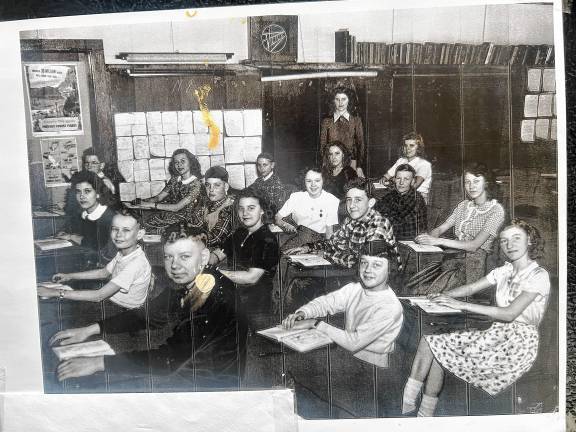 Newfoundland School seventh- and eighth-graders with their teacher Luella Crowley Kemble in 1949 in the third classroom. In the front row, from left, are Carl Cahill, Patricia Beam and Dawn Jennings. Second row, from left, John Fredericks, Jean Cahill, LeRoy Tice and Mildred Hannah. Third row, from left, Jane Meyer, Carl Stickle, Phyllis Chadwick and Walter Crane. Back row, from left, Bill Reynolds, Shirley Jennings, Wayne Post, Peggy Weaver and M. VanderStad. (Photo provided by the late John Fredericks)