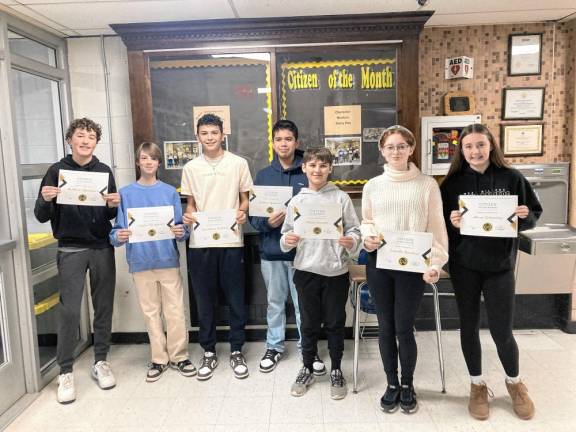 Macopin Middle School students who were named Citizens of the Month for December are, from left, Matthew Afflerbach, Griffin Kleinfelder, Jonathan Andrade, Andrew Quinones, Ethan Guenter, Juliette Mucklow and Alexa Lehansky. The theme of the month was caring. (Photo provided)