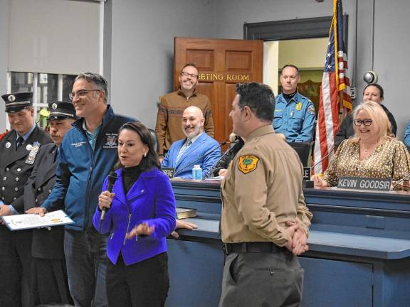 Assemblywoman Aura Dunn speaks during the presentation.