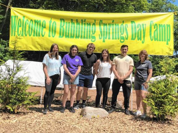 From left are Arianna McGuinness, art coordinator; Amanda Roth, music coordinator; Logan Geritano, third-year counselor; Meghan Ricca, assistant director; Mathew Kochan, second-year counselor; and Flo McClellan, director of Bubbling Springs Day Camp in West Milford.