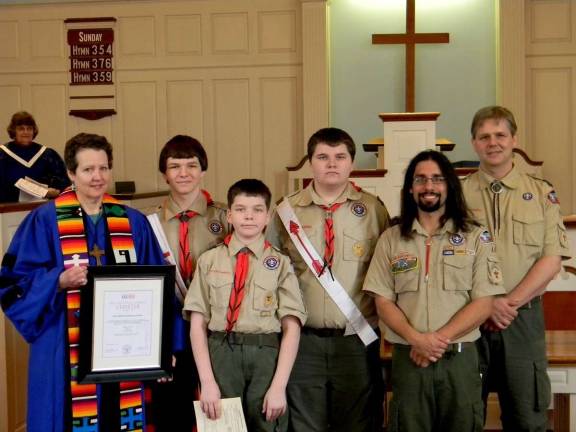 All were happy to celebrate Boy Scout Sunday at the West MIlford Presbyterian Church earlier this month. Pictured here are Phyllis Van Hooker in the back, who attended the Terhune Scout House when it was a two-room school house, and from left, Rev. Janet Macgregor-Williams, Eddie Kelly, Ryan Kelly, Donovan Kelly, Will Cytowicz and Chris Mulberry.