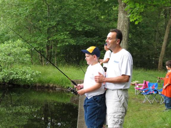 Brandon and his dad, Brian, enjoyed the fishing and spending time together at the annual fishing derby.